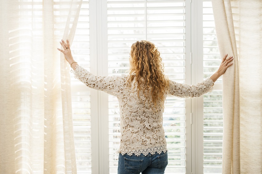 How to use curtains and plantation shutters to control natural light?
